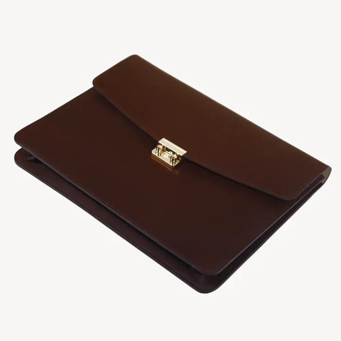 Premium leather laptop portfolio with brass hardware and polished edges