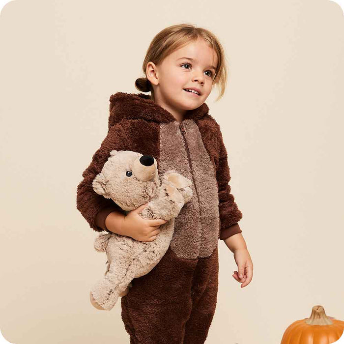 Child holding a Soft Warm Weighted Brown Bear Warmies