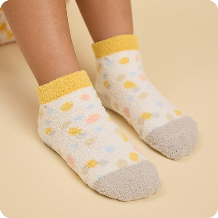 colorful calico cat socks on kids feet
