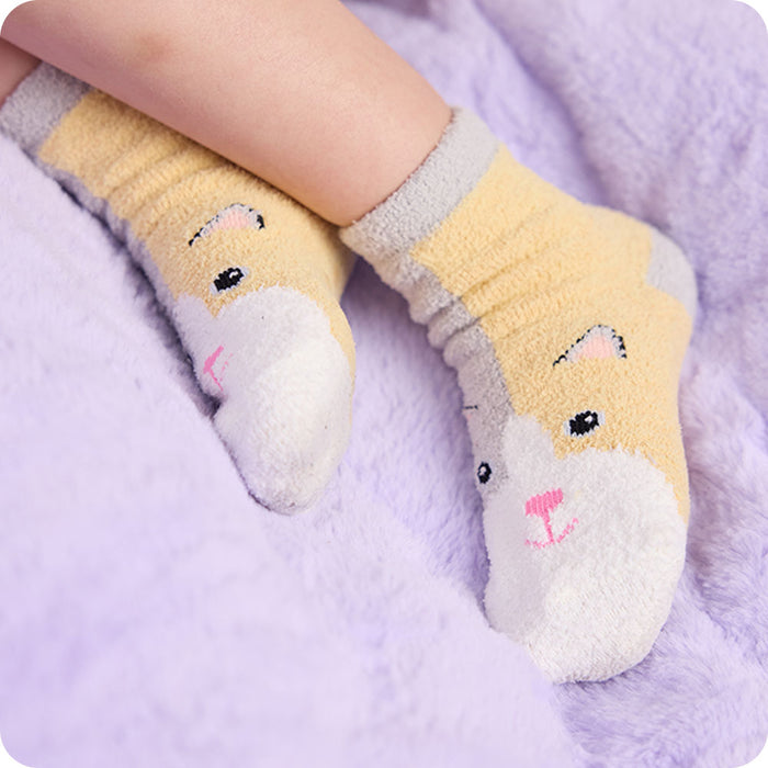 detail of warmies calico cat socks on purple background