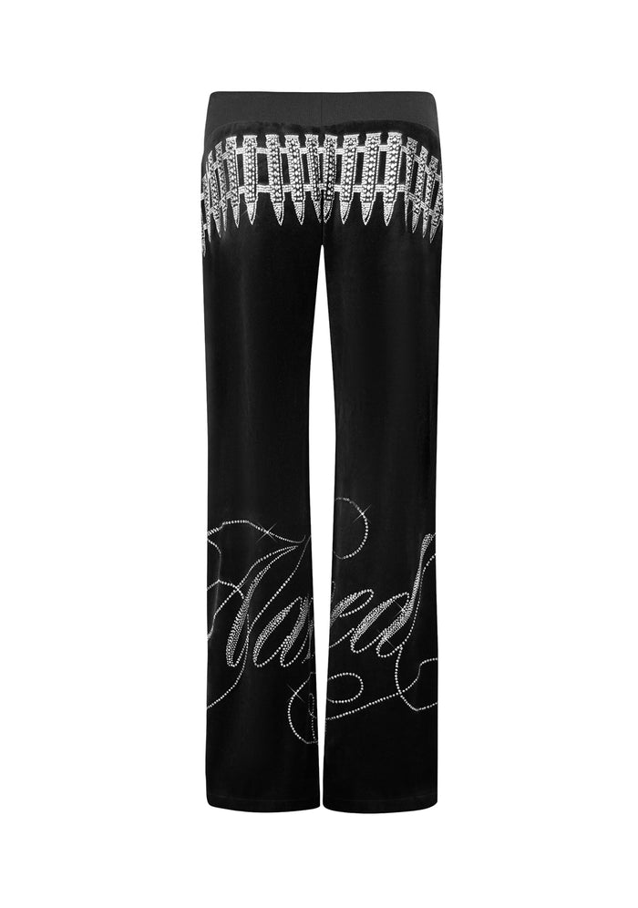 Back view of black velour sweatpants featuring rhinestone embellishments.