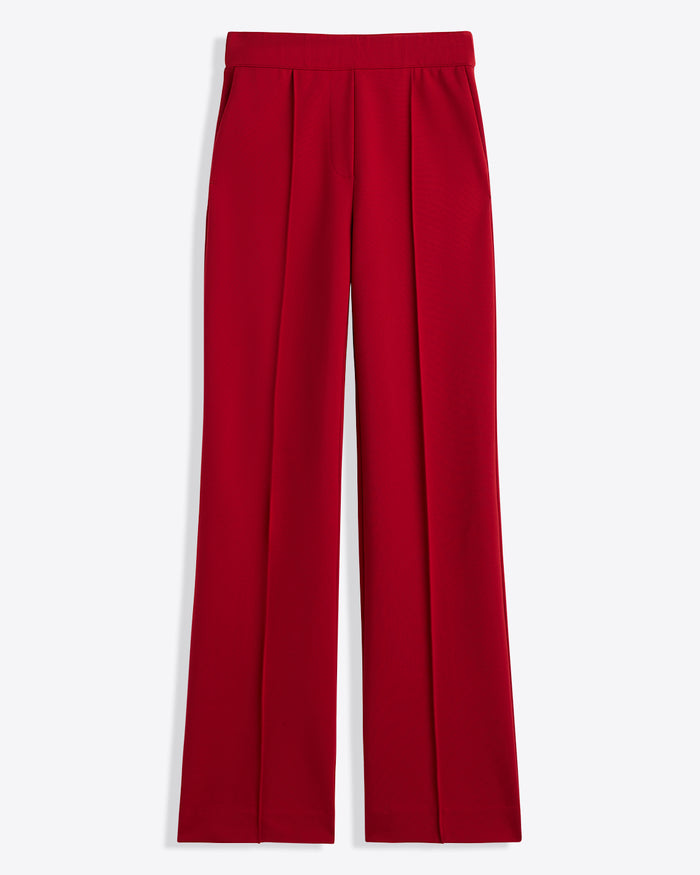 The Draper James Flare Pants in Ponte, featuring a high waist, straight-leg fit, lipstick color, front pleats, and side pockets, are shown laid flat on a white background.