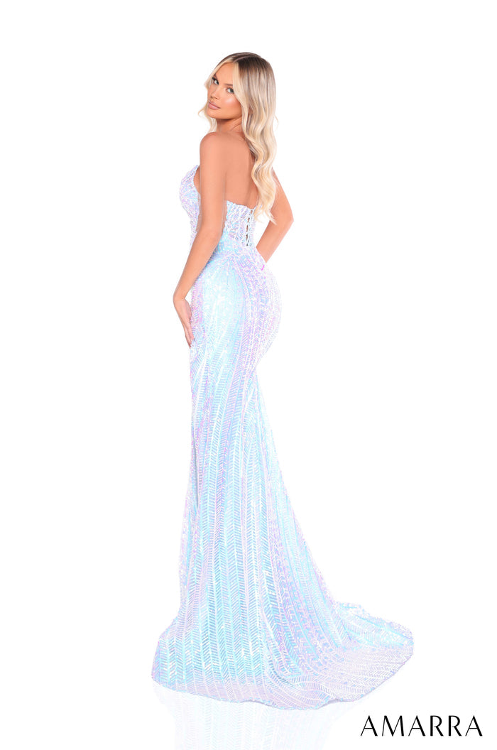 A strapless, iridescent blue-purple sequined mermaid gown with a long, flowing train by Amarra.