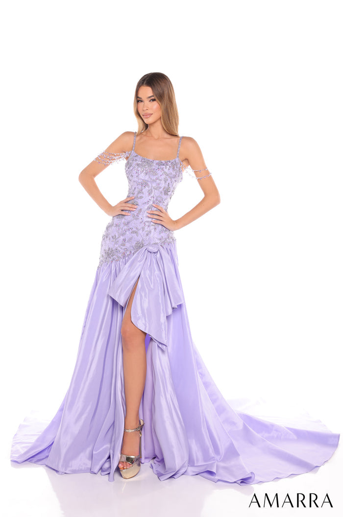 A model wears a lavender evening gown with intricate beading and a high slit, posing against a white background.