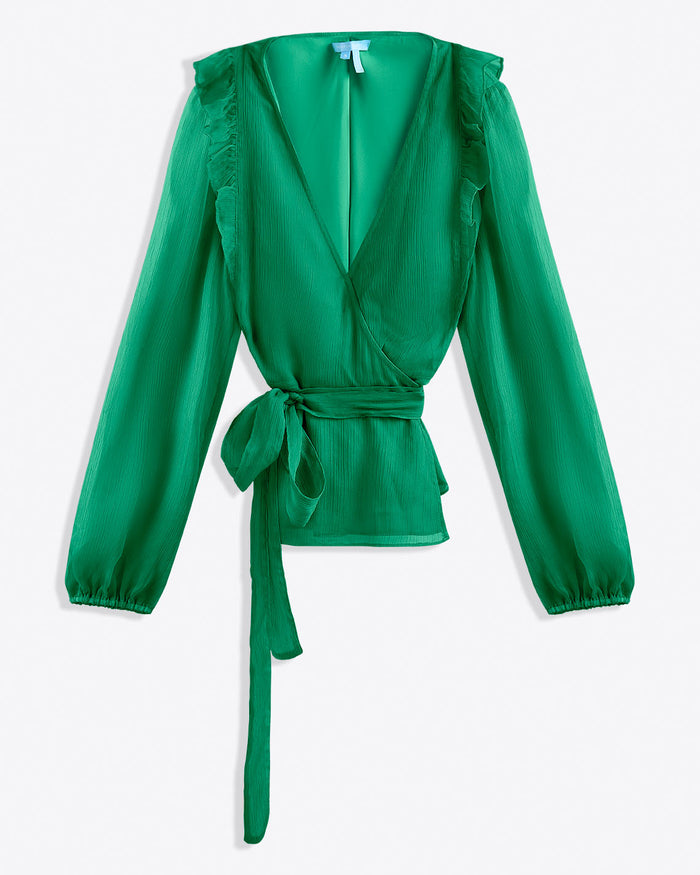 This Draper James Wrap Top is a versatile green long-sleeve blouse with a deep V-neck, ruffled shoulders, and a chic tie-waist belt.